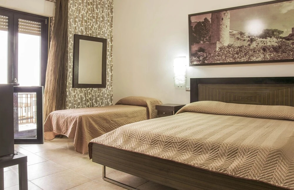 Standard Triple room with balcony