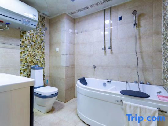 Двухместный люкс с видом на море двуспальная кровать в Rizhao Shuohai Seaview Homestay (Wanpingkou Branch)