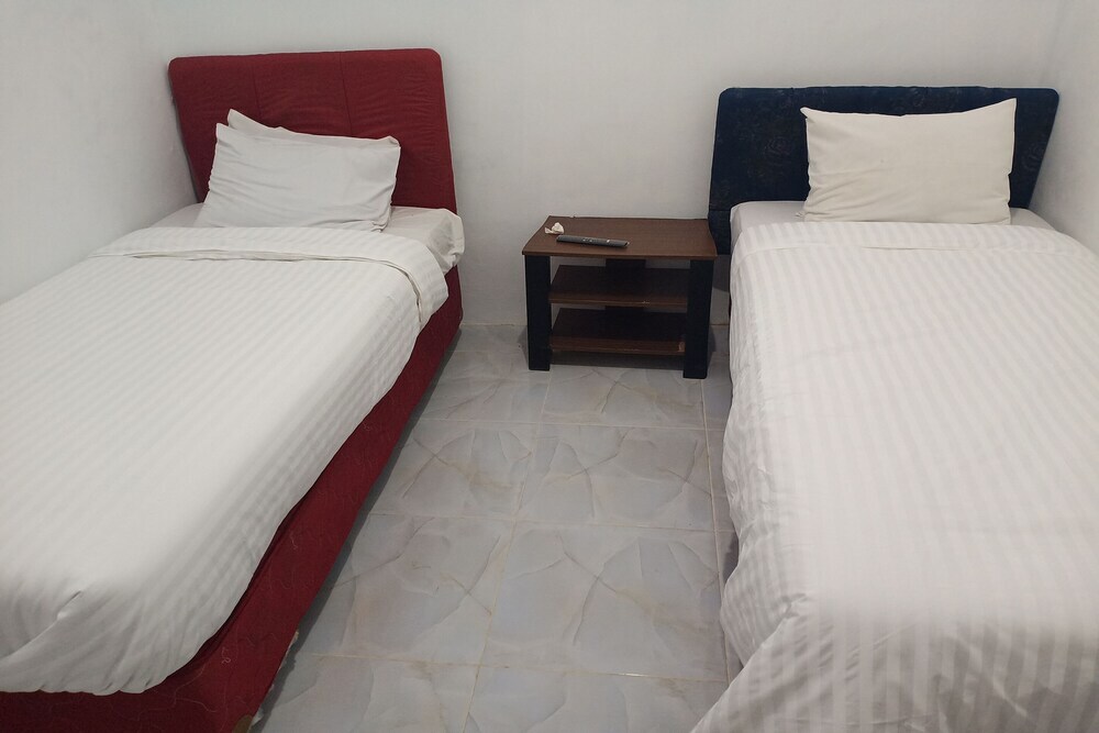 Отель Krui Syariah by OYO Rooms, фото 18