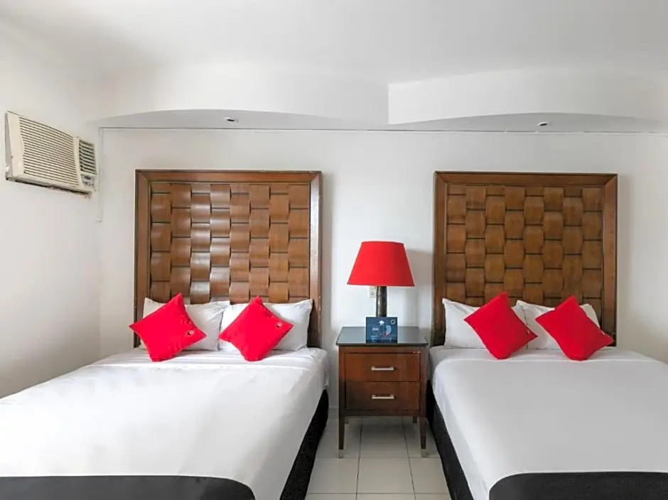 Capital O Zona Dorada Inn - Chambres