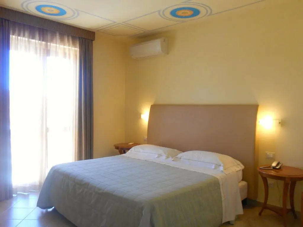 Hotel Saturno Fontepura - Chambres