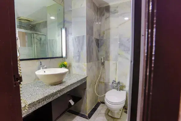 Johns Pardede International Hotel - Chambres