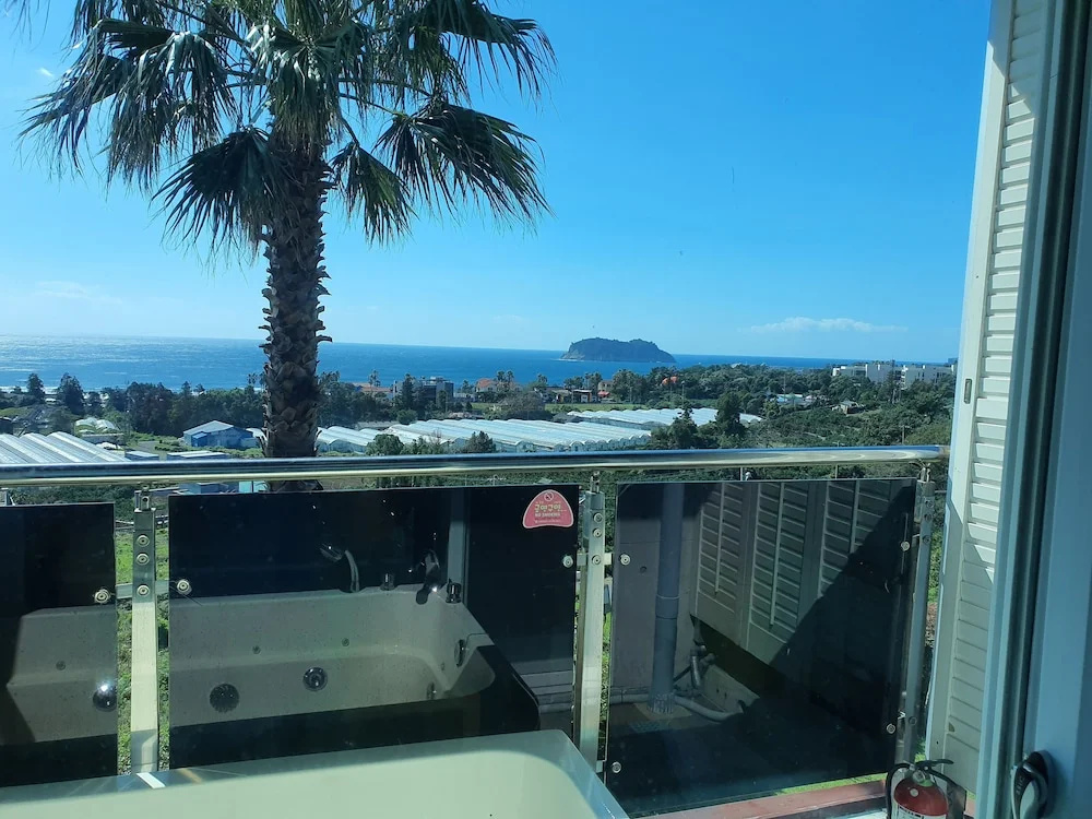 Comfort room with balcony and with ocean view
