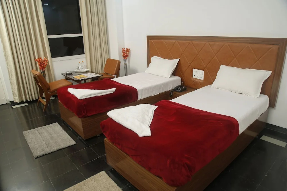 Amaravathi Hotel - Chambres