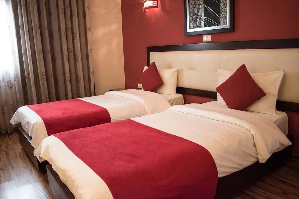 Al Murjan Palace Hotel - Chambres