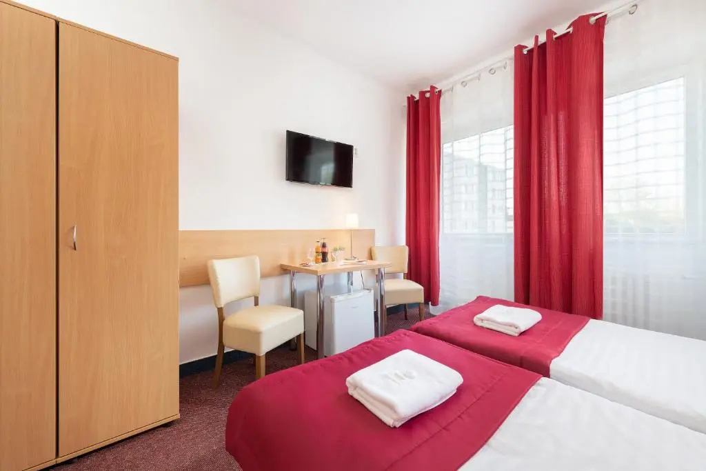 Hotel Plus - Chambres