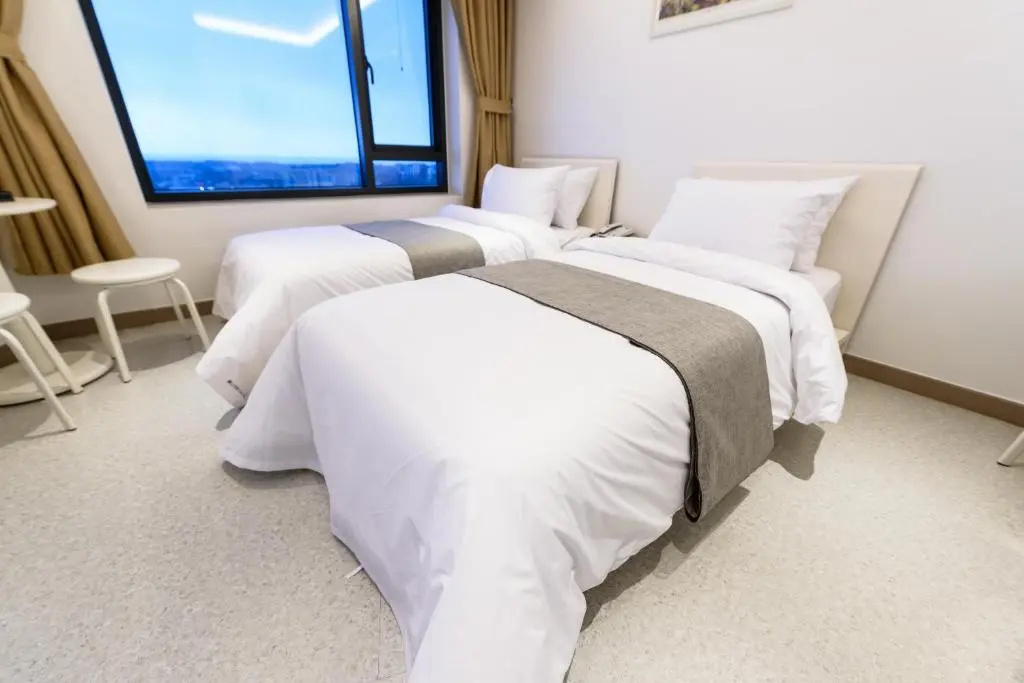 Rezion Hotel - Chambres