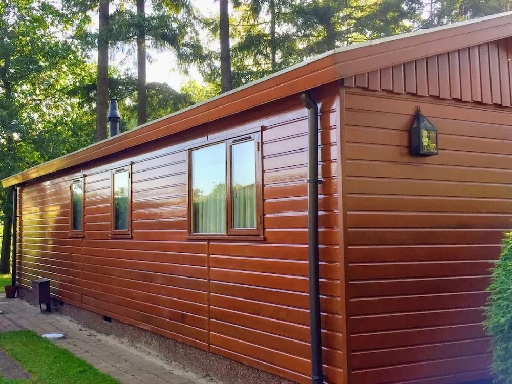 Chalet in Holiday Park With Spacious Living Room, Large Enclosed Garden and Unobstructed View