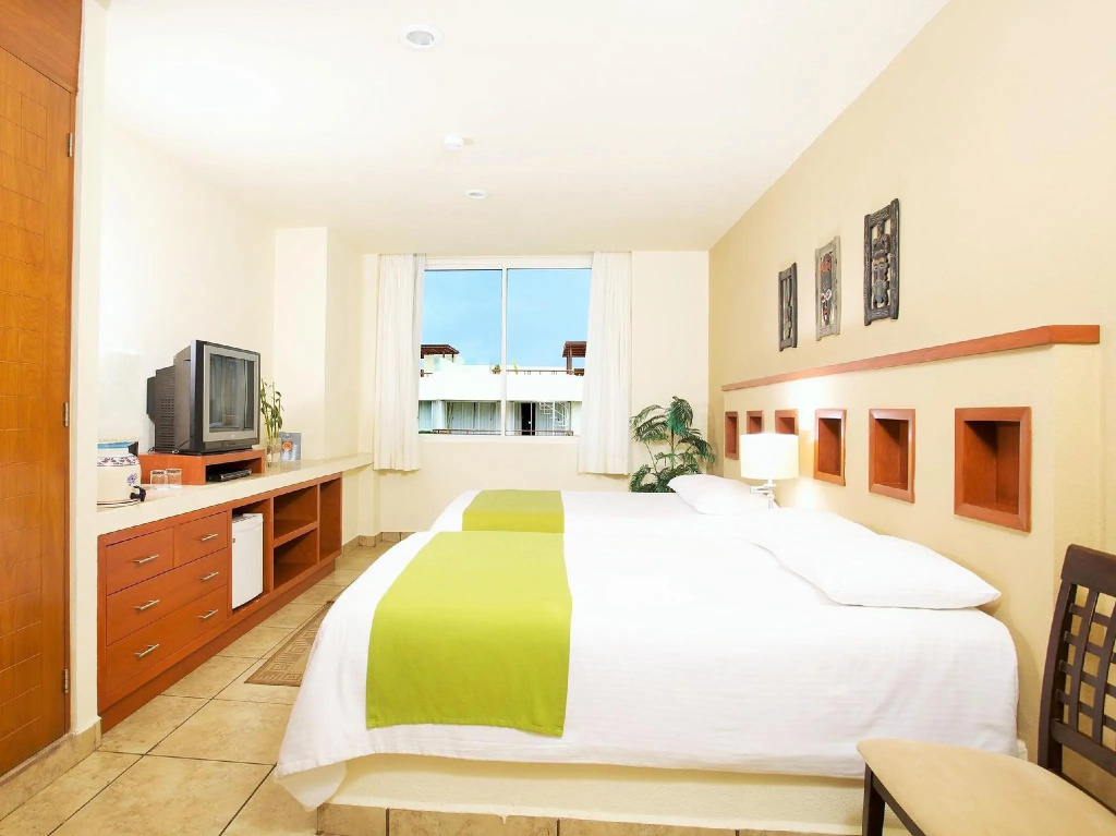 Ixchel Beach Hotel - Chambres