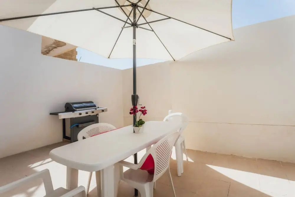 Seafront Gozo Escape BBQ Backyard by Qbajjar Bay