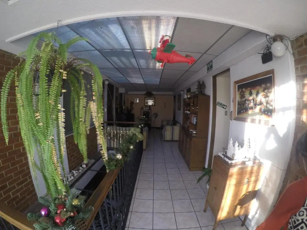 Mariana's Petit Hotel - Chambres