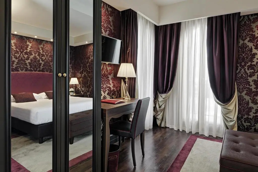 Hotel American Dinesen - Chambres