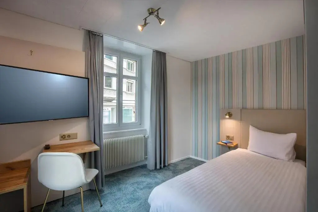 Hotel Krone by bsmart - Chambres