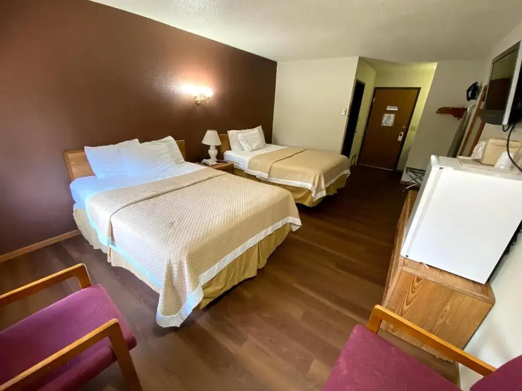 Woodlands Inn & Suites - Chambres