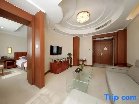 Sanyuan Hotel - Chambres