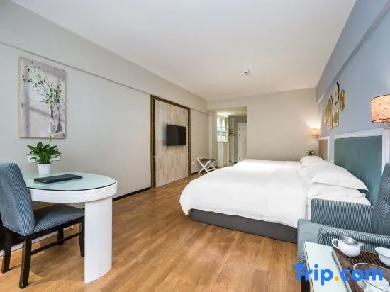 Jinyi Hotel - Chambres