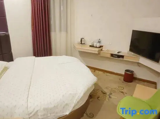 Huatian Hotel - Chambres
