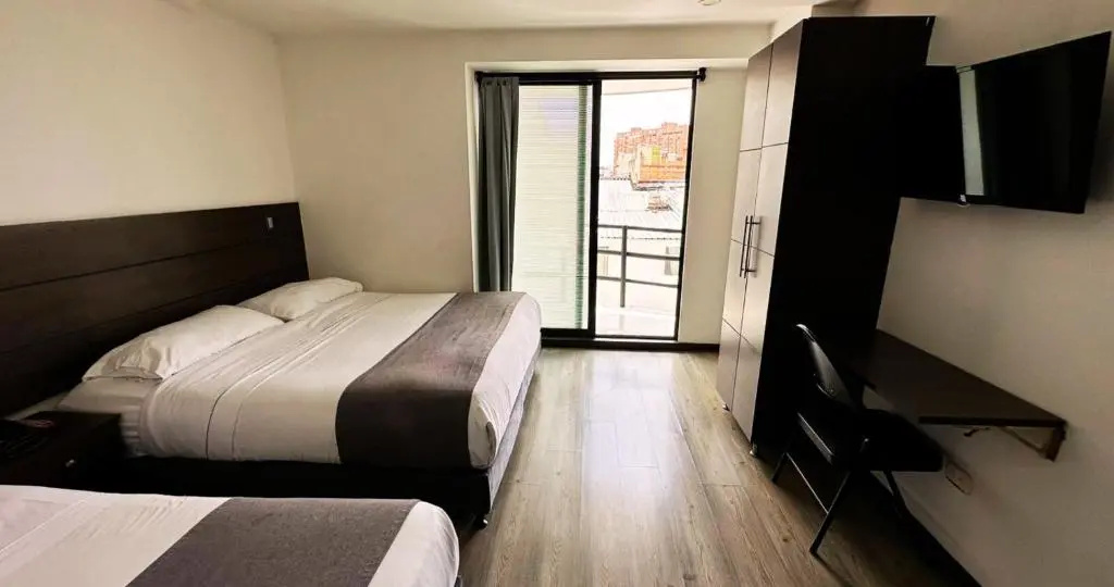 Expo Hotel Ferial - Chambres