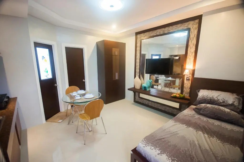 NF Suites - Chambres