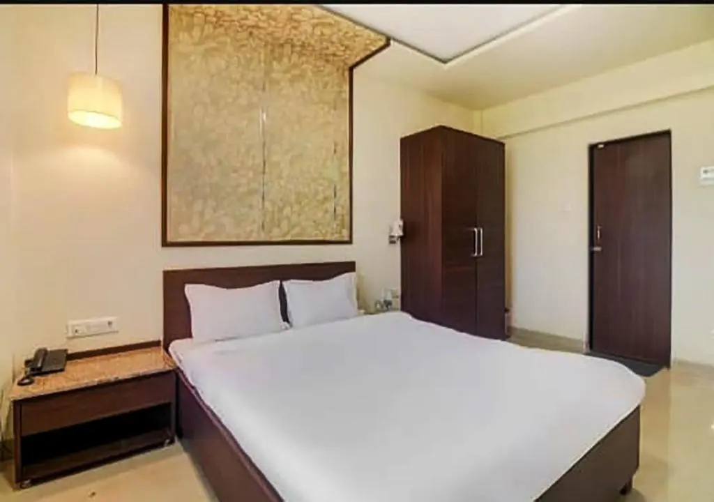Hotel New Elite Inn - Chambres