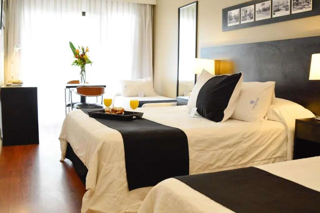 Pocitos Plaza Hotel - Chambres