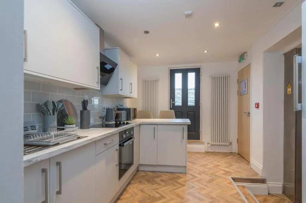Heritage Serviced Suites - Chambres