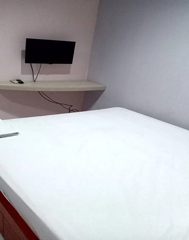 Super OYO 91104 Griya Mitra Residence