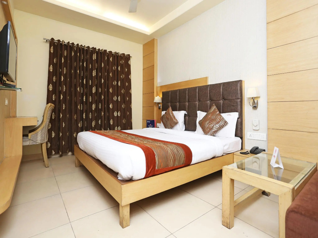 Capital O 1547 Hotel The Oasis - Chambres