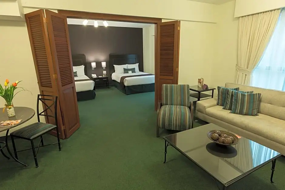 El Polo Hotel & Suites - Chambres