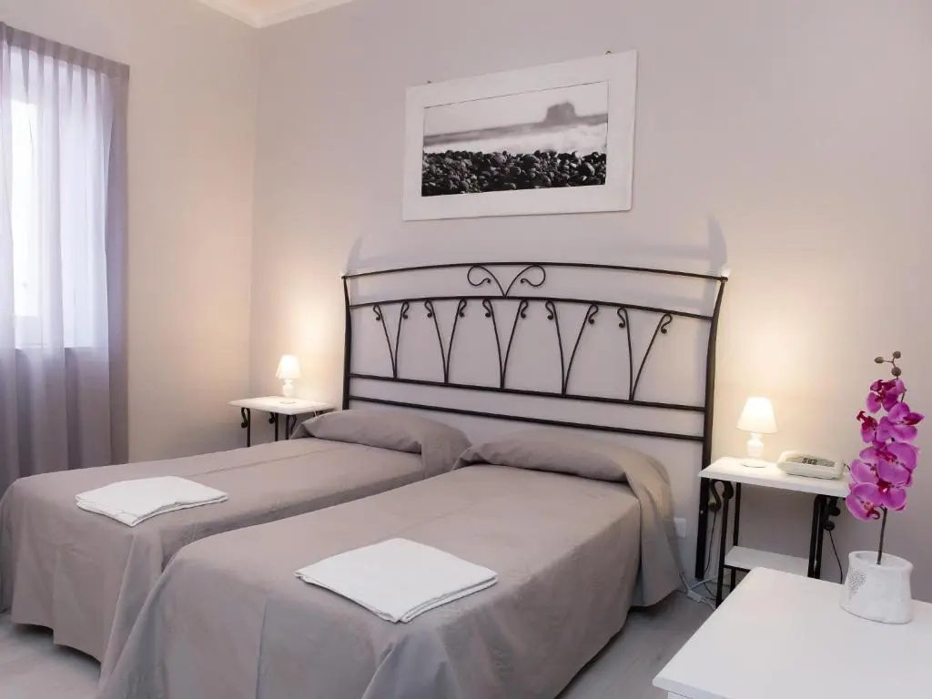 Pietra Pomice Hotel - Chambres