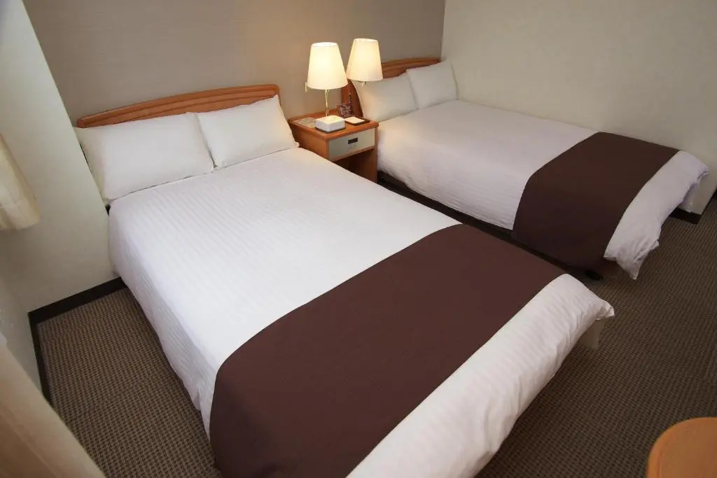 Toyooka Sky Hotel - Chambres