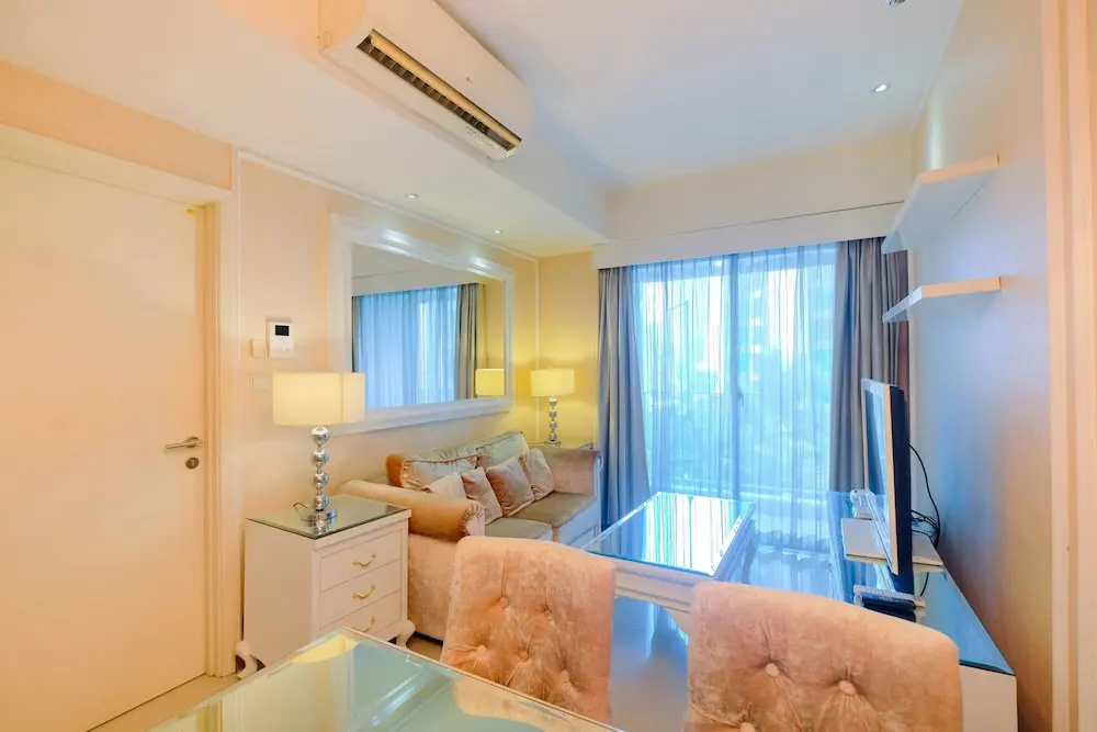Modern and Comfortable 1BR at Casa Grande Apartment By Travelio