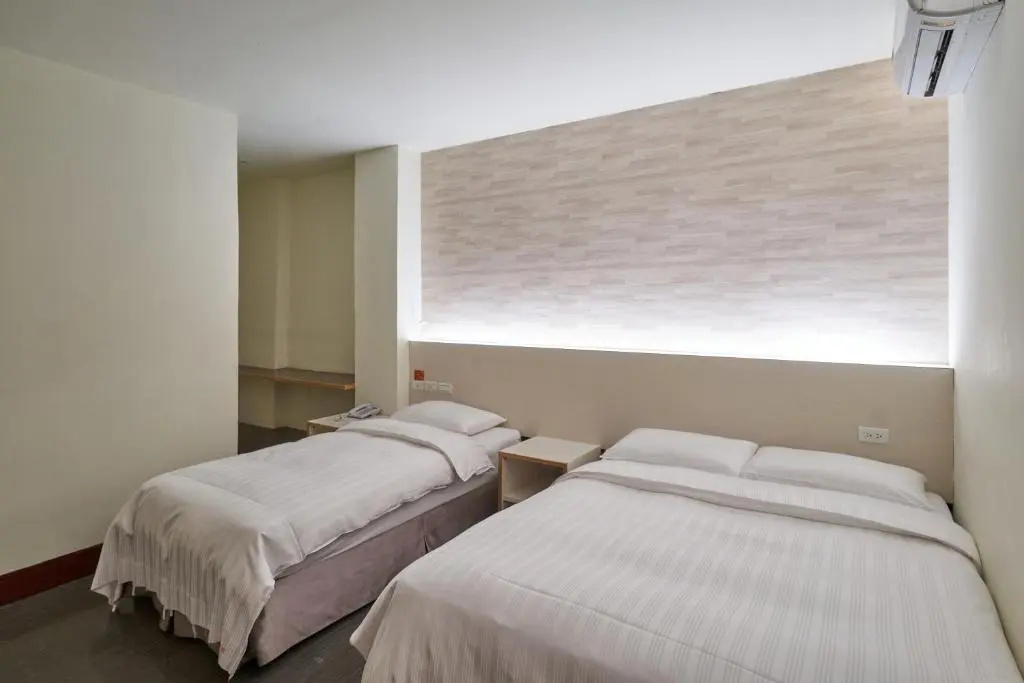Yung An Business Hotel - Chambres