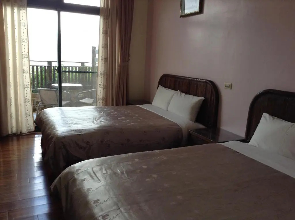 Standard Quadruple room with garden view