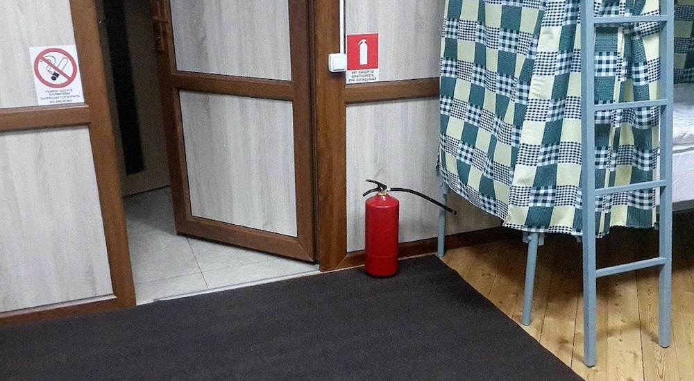 Кровать в общем номере в Good Inn