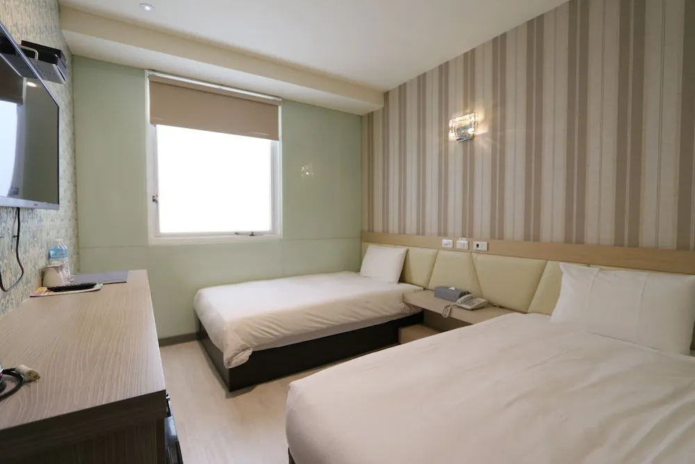 Chao She Hotel - Chambres