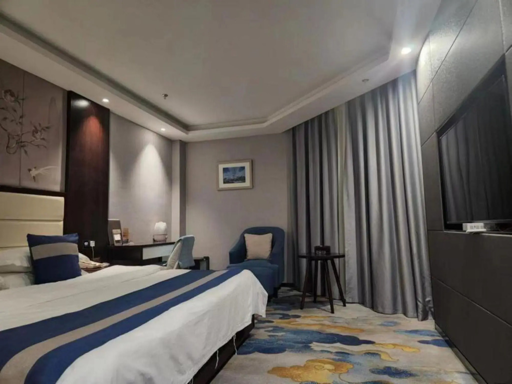 Hetian Huaya Hotel — фото 5