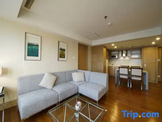 Jingguang Center Apartment Hotel - Chambres
