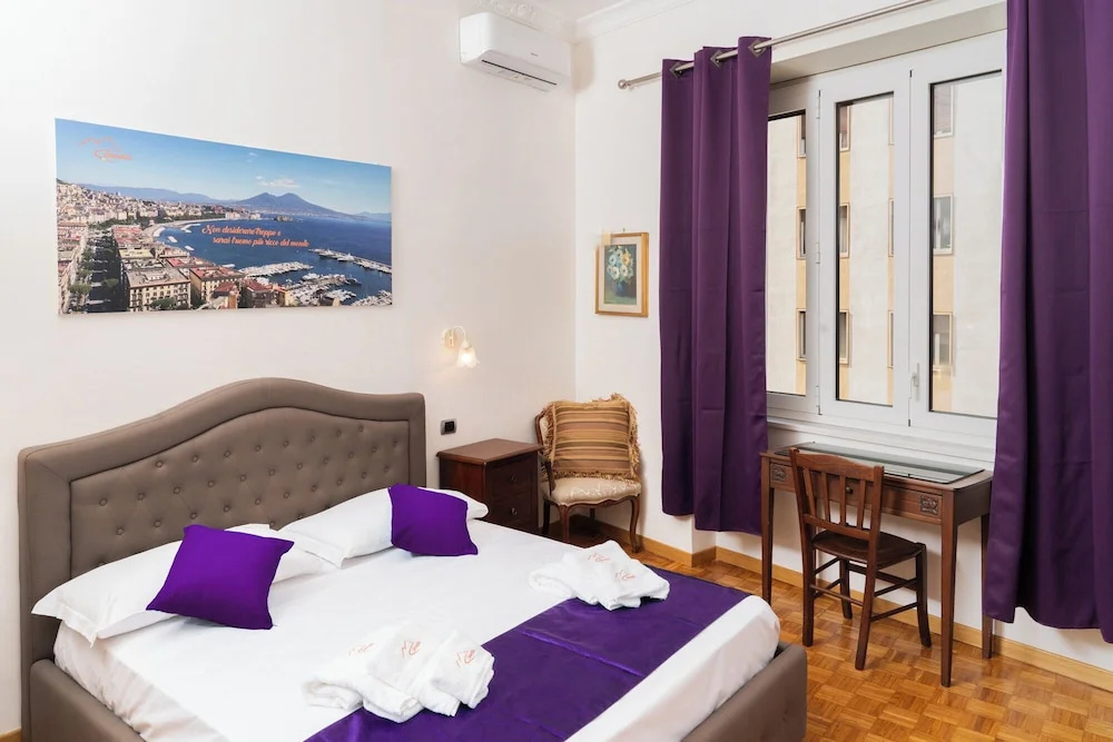Deluxe Quadruple room with city view