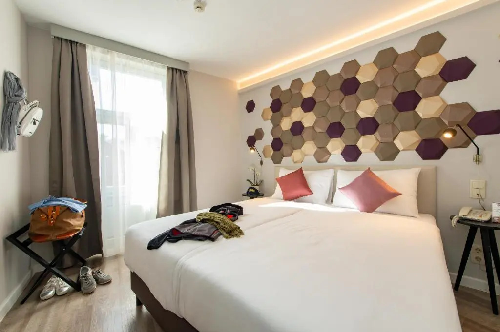Three Corners Hotel Art - Chambres