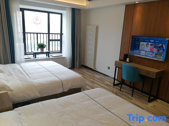 Двухместный номер Deluxe 2 отдельные кровати в Sheraton Hotel (Zhengzhou 270 Wanda Zhengshang Yujianmingzhu Branch)