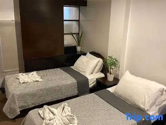 Be-ing Suites - Chambres