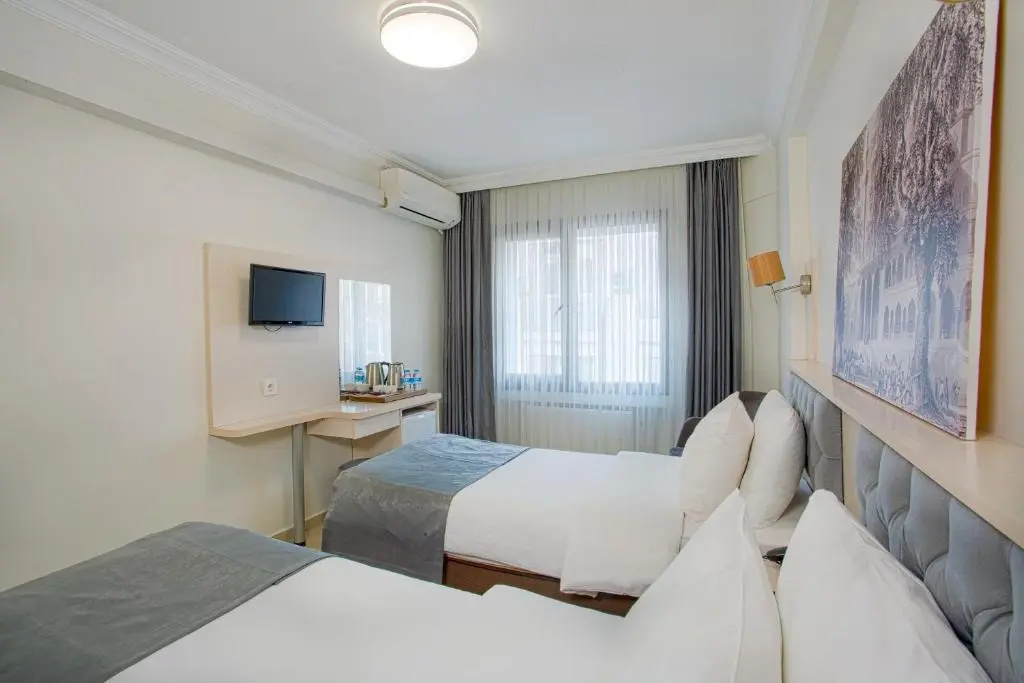 Sim Hotel - Chambres