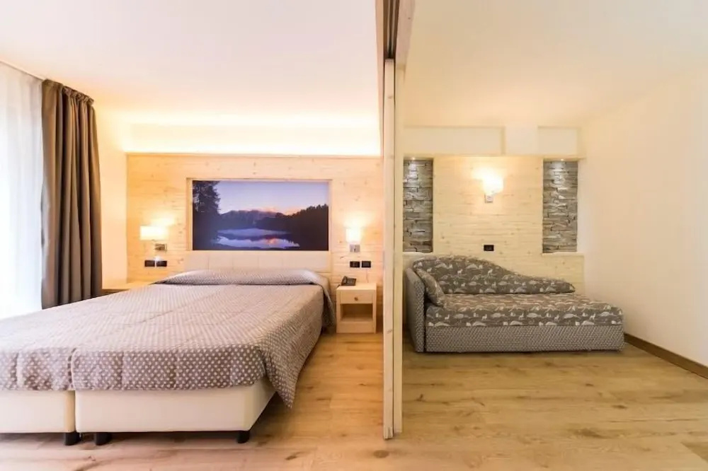 AlpHoliday Dolomiti Wellness - Chambres