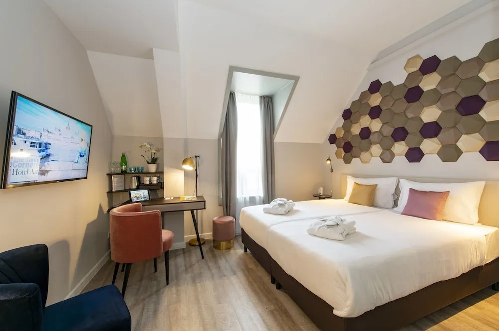 Three Corners Hotel Art - Chambres