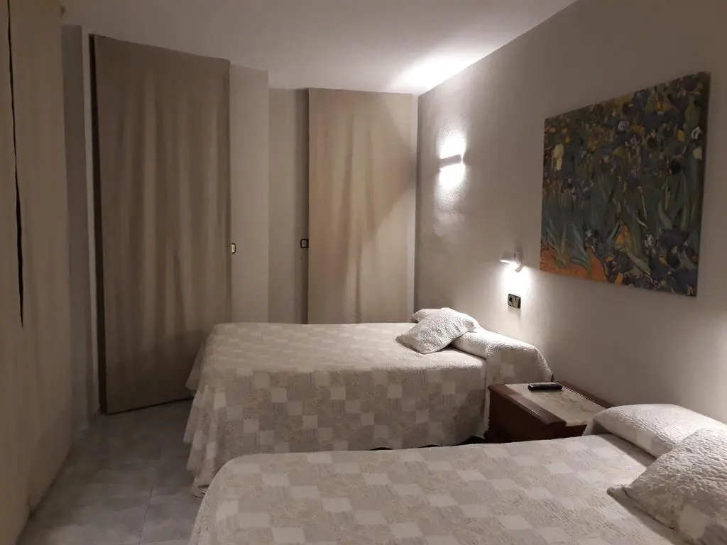 Standard Quadruple room with garden view