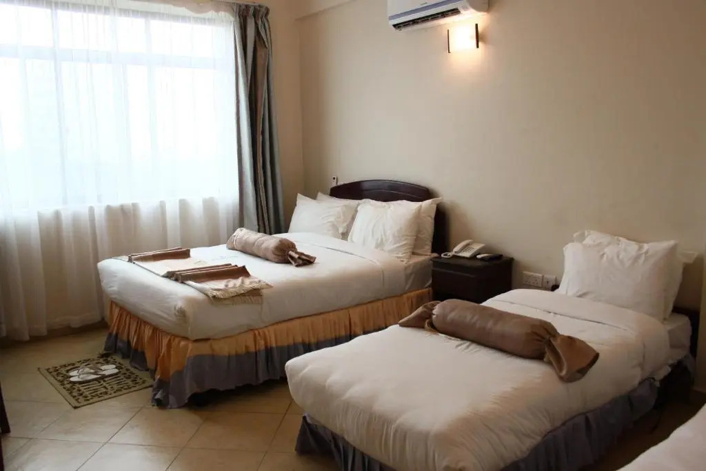 The Grace Land Hotel - Chambres