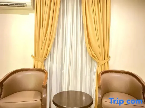 The Amrani Syariah Hotel - Chambres
