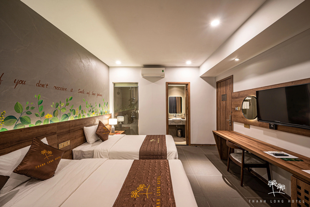 Thanh Long Hotel - Tap to explore photos