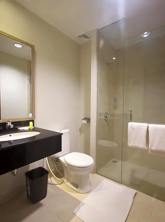 Genio Hotel Manado - Chambres